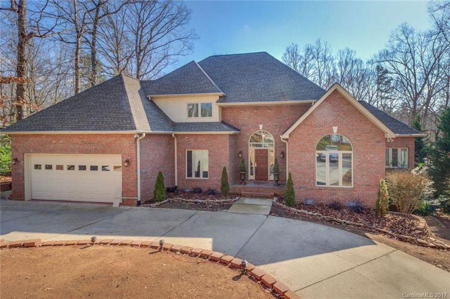 Beautiful full brick w/walk out basement, covered patios, screened porch and deck; Great room w/vaulted ceilings, skylights; 2 sided f/p to kitchen/breakfast area and great room; formal dining room; large owner's suite with large bathroom; finished basement with large bedroom/bathroom; rec and den; workshop; lots of storage space throughout the home; low maintenance yard and energy efficient with beautiful retaining wall.  The home is immaculate and great entertaining space inside and out!