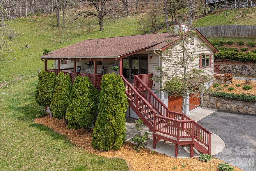 If you’ve been waiting for something in Maggie Valley that feels updated, comfortable, and easy to settle into, this one is worth a look. Right in the heart of Maggie Valley, this home offers that comfortable, easy feel from the moment you walk in, paired with thoughtful updates that make everyday living simple. The main level is set up for convenience with 2 bedrooms plus a bonus room, along with 2 full bathrooms, giving you flexibility for guests, a home office, or additional sleeping space. Natural light fills the home and highlights the soft, neutral tones throughout, creating a bright and welcoming atmosphere while still keeping that cozy mountain feel. The kitchen has been recently updated with granite countertops and new stainless steel appliances, and it flows nicely into the main living area, perfect for both everyday living and spending time with family or friends. The bathrooms have also been refreshed with Kohler fixtures, Grohe valves, updated vanities, and tile, offering a clean, timeless look. Downstairs, the fully finished basement with a full bath provides additional living space that can easily serve as a guest suite, recreation area, or second living room, giving everyone a little extra room to spread out. You’ll also appreciate the larger updates that have already been taken care of, including a new 25-year roof and an epoxied garage floor, adding both durability and a polished finish. Set in a location known for its scenic beauty and mountain lifestyle, this home is just a short drive to Waynesville and within easy reach of Asheville, offering access to dining, shopping, and outdoor activities while still enjoying the peaceful setting of Maggie Valley. Whether you’re looking for a full-time residence, a second home, or a place to come and unwind, this one offers a layout that works, updates that matter, and a setting that’s hard to beat.