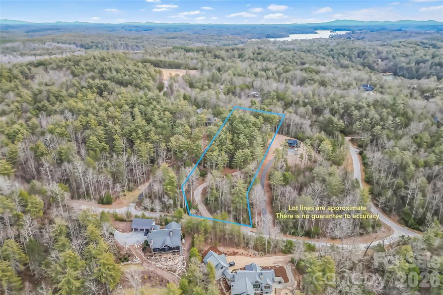 Enjoy the winter mountain and sunset views from the top elevation of this 1780 property. Driveway has been graded and graveled allowing easy access to the top of the lot.  Gentle slope to road and enough space to spread out and have privacy.  Although this lot does not have a deeded slip, 1780 does allow owners to rent their slips to to other residents. Camp Lake James membership conveys and includes fitness center, tennis and pickleball courts, walking trails, community dock, Camp facility and activities.  Lot have been perced for 4 bedroom home but there is no minimum square footage required.  Convenient to Lake James State Park, Fonta Flora State Trail and Pisgah National Forest.
