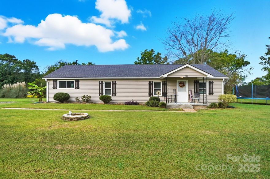 Ready to get out of your subdivision and want some yard space?  Now is your time to break free from the city life and come see the mountain and sunset views from your new home.  This home offers just over 1.5 acres with cleared space to start a large garden, plant fruit trees, and to let your green thumb go wild.  Walking into the home it offers an open living room space, kitchen with newer cabinets, stove newer, and dishwasher.  With several new fixtures throughout the home, No HOA, Walk-in closet in primary bedroom, Fire pit, and close to hwy 85 for a 30 min commute to Charlotte.  Casino is almost done and 5 mins away.  Maybe some tiny homes in the back yard to Airbnb?  USDA available with NO money down to get into this home today!