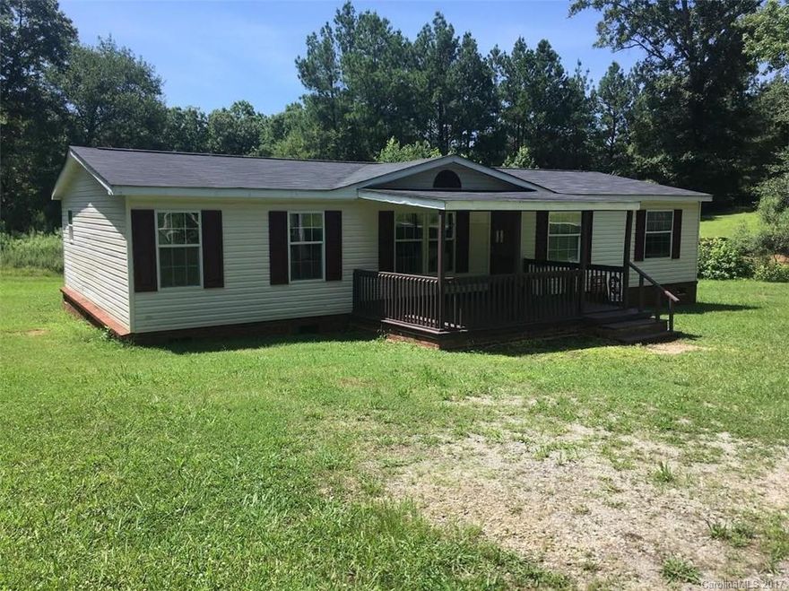 Wonderful home located minutes from I-77 in theLewisville school district and. Freshly painted and laminate flooring throughout the home. Large covered from porch and country serenity yet close to commerce. Priced to sell!!