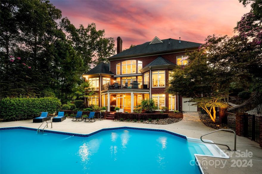 Custom Harry Grimmer Home in Providence Plantation nestled on ~1 acre. Carefully designed floor plan w/ Hardwood floors on main level & 2nd fl. Main level has Large formal spaces, high ceilings & vaulted great room. Updated Kitchen w/new appl, Marble Counters & backsplash. Beautiful Library w/ built in bookcases. Office, Laundry & large Primary suite W/FP located on main level. Upstairs is 3 very large BRs w/loads of closet space – one Ensuite bath & two w/Jack & Jill Bath. Walk-in closets have custom closet systems. There is also a Flex space that can be used as addt’l BR. The basement walks out to a stunning pool & is an entertainer’s dream. You will find a Family room w/ kitchenette, Full Bath, Rec room that could be potential 6th BR, exercise room, & screened porch. There is Loads of storage, including full walk up attic, pool storage room & storage/work room in 3-car garage. The pool & pool deck, Screened Porch & Trex deck enables you to enjoy this large, private, treed lot.