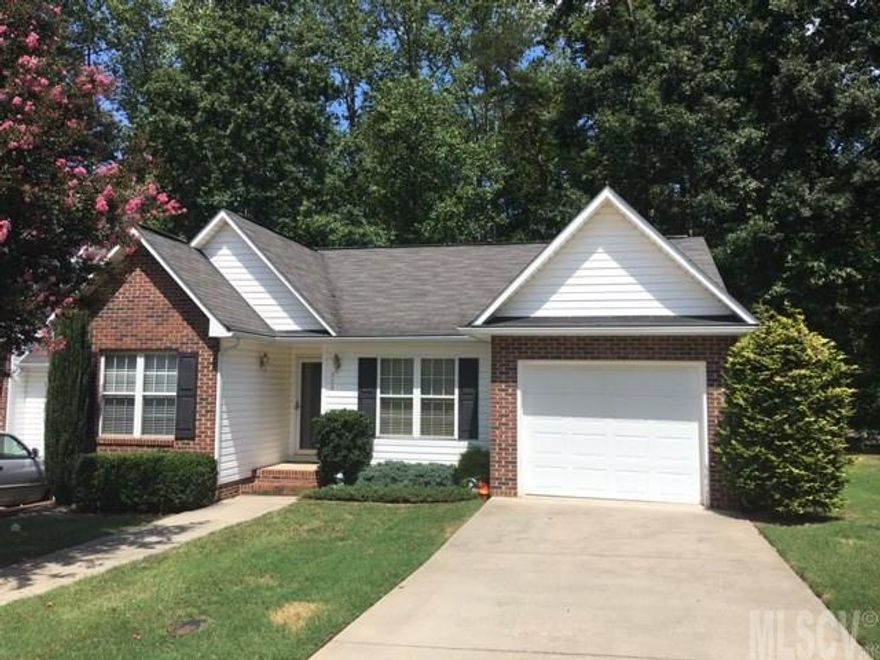 A rare find...all one level townhouse with sgl garage, end unit, move-in condition! Fantastic kitchen with breakfast nook, living room has gas fireplace and doors leading out to private, rear deck. Master bedroom with master bath and walk-in closet. Nice size second bedroom and attic storage above the garage. Hardwood flooring in living room, kitchen and hallway.  Large walk-in crawl space is great for additional storage! No HOA dues.