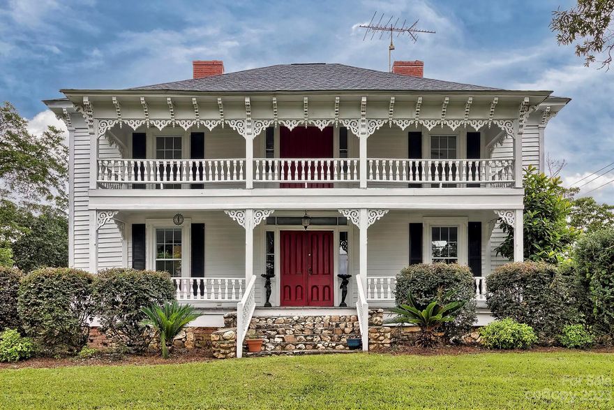 EXQUISITE historic home located in the quaint town of Jefferson, SC.  This 3,674 square foot home is situated on a beautiful, well landscaped 1.80 acre lot with beautiful pecan and matured oak trees- surrounded by a timeless wall of stone.  This home is full of SOUTHERN CHARM and CHARACTER!  Boasting many updates such as kitchen, baths, laundry, and refinished hardwood floors- this home has been slightly modernized with well-kept historic features.  Five bedrooms that could easily be used for other purposes and three bathrooms.  Just a short walk from two of Jeffersons delicious restaurants, shopping, walking trails, local recreation facilities, and town park.  This is the perfect place to raise a family!