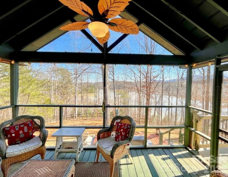 Live like your on permanant vacation in the mountains in this just right log cabin overlooking Lake Adger. This perfet 2BR 2BA cabin comes with a deeded boat slip located just across the road. The screened porch is the place to be in 3 seasons with lake, mountain and wooded views all around. Recently remodeled, this delightful cabin couldn’t be more neat, clean and comfortable. Open living room, stone fireplace, nice kitchen and dining area.  Good internet to work from home. Lake Adger is a gorgeous super low density planned community, one of very few in WNC with equestrian amenities, riding trails, horse farm properties, lake amenities and deeded boat slips. The lake is ‘quiet’ for boats with motor and spec limits. Lake views are another valuable rarity. Most communities don’t have this out in woods country feeling, yet are still located near gsweet small towns - Tryon, Columbus, Landrum, and in Mill Spring, Tryon International Equestrian Center. Many choices of nearby airports in Asheville, Charlotte, Greenville / Spartanburg. The real estate corridor west of Charlotte and north of Atlanta, referred to as ‘Charlanta’, has some of the fastest growing zip codes and suburbs in the U.S.  Polk County is tucked away in these mountains, 2 hours northwest of this population growth. Our mountains, rivers, lakes, vast national forests, game and conservation lands and careful land planning make our area feel like a fairyland universe, close enough to towns and cities, but not too close. We’re about 45 min from Asheville. Our area is not widely known, and most relocating newcomers discover us by accident or through friends, and are thrilled to live in such spectacular surroundings. No drive by please - house is at the end of a quiet cul de sac -  showings by appointment only.