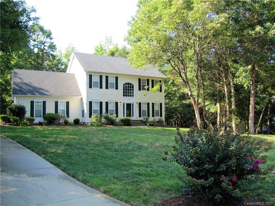 Classic beauty on large lot has mature landscaping, irrigation system, great attic storage, wiring for security system, expansive deck, hardwoods and moldings. Floor plan includes formal LR and DR, family room w/masonry fireplace, kitchen w/breakfast nook w/bay window. Master has tray ceiling, walk-in closet, bath w/garden tub and shower. Side-load 2-car garage plus detached 1-car garage/workshop wired for electric and HVAC! Close to schools, shopping and I-485!