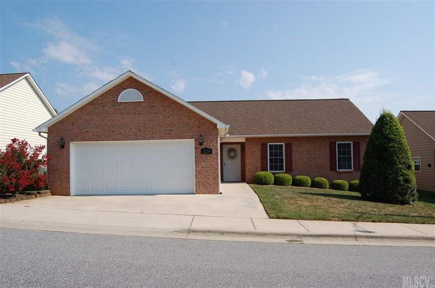 RECENTLY UPDATED   This immaculate 2 bedroom 2 bath patio home in lovely Wexford Village has been tastefully updated.   Cozy living room has outside door to deck.   Dining room for intimate dining.  Kitchen has new Frigidaire Gallery stainless steel appliances, granite counter tops and ceramic tile back splash.  Extra room off living room could be a home office/computer room or sewing room.  Crown molding throughout.  New slate flooring in foyer, utility room, kitchen and bathrooms.  New carpet in living areas and bedrooms.  New paint and window blinds.  Both bathrooms have new granite counter tops.  Two car garage with no steps into house.  Low maintenance exterior and yard for carefree living.  Conveniently located to major highways and retail stores and restaurants.  City of Lenoir Aquatic Center and Greenway is nearby.