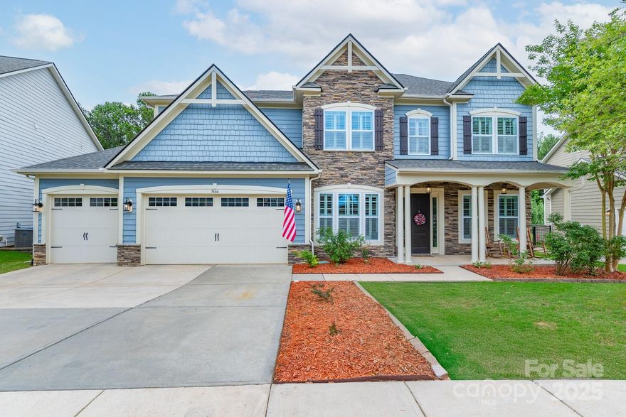 Get ready for the Tega Cay lifestyle in Lake Ridge! This beautifully finished home will catch your attention at every turn. Raised ceilings, 4-inch hardwoods, crown & wall moldings, whole-home speakers, custom built drop zone. Entertain with ease in the luxurious island kitchen that opens to the living room, providing easy access to the screened patio. French doors & coffered ceiling appointed office. Full guest suite on main provides flexibility for visitors or multi-generational living. Upstairs you'll find the additional bedrooms, including an oversized primary with tray ceiling, sitting area & extra closet. The primary bath is spacious, relaxing & the walk-in closet offers custom built-ins. Unwind in the media room with a show or movie. The rocking chair front porch, paver patio, stone fireplace & a tree-lined backyard create a private & inviting feel. The 3 car garage provides extra storage & space for all your lifestyle items.