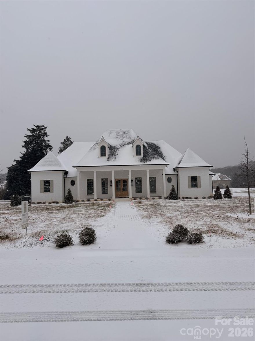 Beautiful French country painted brick ranch on large level Lot. 12’ and 10’ ceilings, hardwoods throughout, custom built cabinetry, wonderful out door living space. Home will be completed in 30 days buyers can still select finishes.