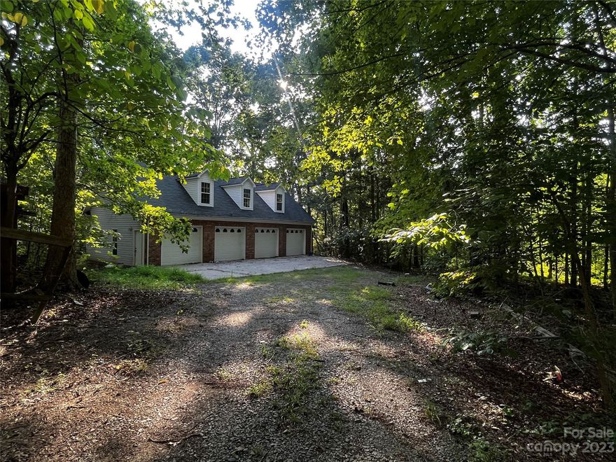 Beautiful .89 acre lot with 4 car detached garage in the desired Farmwood Community in Mint Hill. No trespassing, please do not walk property without an appointment.  Showing appointments available starting 8/18.