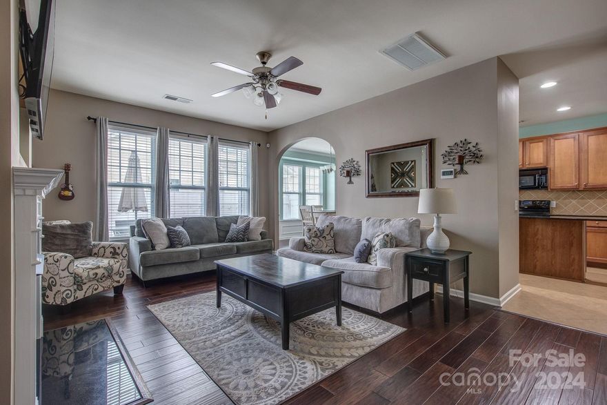 LARGE TOWNHOME! DOUBLE GARAGE! IMMACULATE!  This very rare large townhome has been exceptionally maintained and offers an  open floorplan for entertaining in the main to include 1/2 bath, great room w/ fireplace, dining and eat at bar!  The kitchen has lots of cabinets, a pantry and right off the double garage large which is enough for storage.  The back yard is fenced and has turf artificial grass installed professionally for ease of maintenance and year round enjoyment! The spacious primary bedroom has walk in closet, soaker tub, stand up shower and water closet!  A loft has been converted to an in-home gym and can also be used for an office, media lounge and more!  The other bedrooms have plenty of storage and natural light!  The HOA for this community INCLUDES WATER - so no water bill!  The one you have been waiting for is here!!