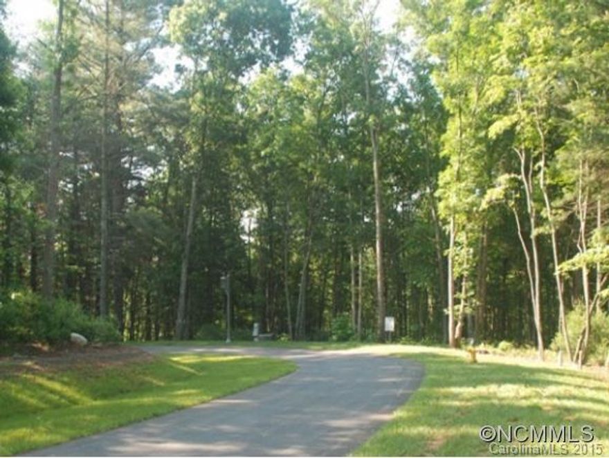 Premier double lot on private cul-de-sac. A natural wooded setting with a deep, gently downward slope to Dingle Creek and the bike/hike trail w/o trail being seen. Lg building site with Southern Exposure. Lovely parks and serene walking trails are located throughout the neighborhood a nice complement to the Living Well Center. The lots may be subdivided.