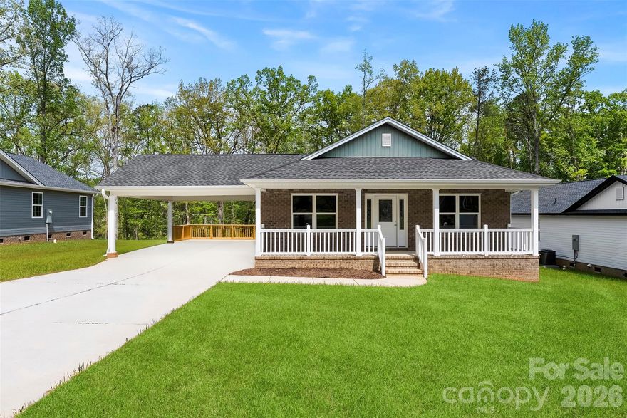 Welcome to this new construction home in Bessemer City. Offering 3 spacious bedrooms and 2 thoughtfully designed bathrooms, this home blends modern style with everyday comfort.

Step inside to an inviting open floor plan that creates a seamless flow between the living, dining, and kitchen spaces—ideal for both entertaining and daily living. The kitchen is a true centerpiece, featuring granite countertops throughout and plenty of space for gathering with family and friends.

Enjoy quiet mornings or relaxing evenings on the covered back deck, overlooking your backyard and providing the perfect outdoor retreat. The covered carport adds convenience and protection, making day-to-day living even easier.

Experience the charm of Bessemer City, with live music, family-owned restaurants, and the new Stinger Ballpark featuring a playground, splash pad, and walking trail! This home perfectly blends character, comfort, and convenience

This move-in-ready home offers the perfect combination of style, location, and functionality—don’t miss your opportunity to make it yours.