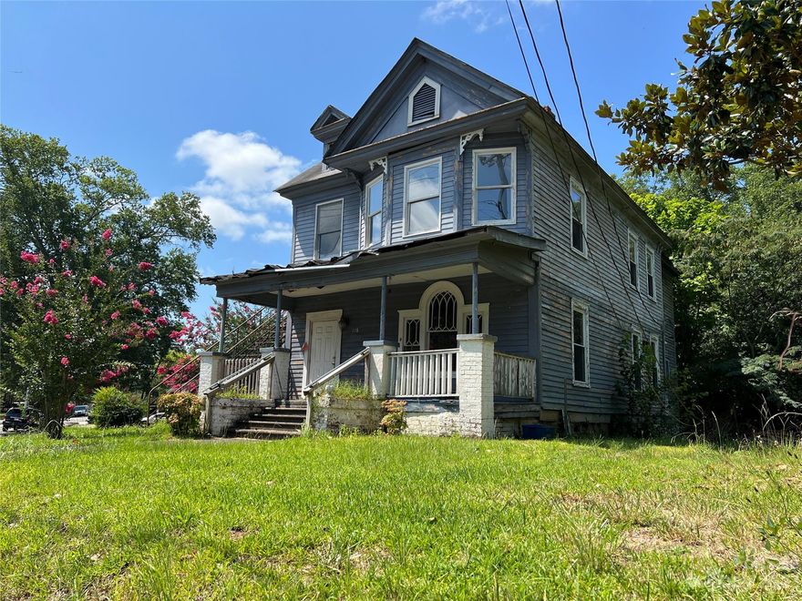 Imagine the possibilities! Check out the hardwood floors! Just a couple blocks from downtown Rock Hill on an amazing street, this classic five bedroom two bathroom home is ready for your updates and personal touches. This would make a great investment property. Whether you are looking for a fixer upper to live in as a primary residence, or a flip, or a rental with potential for multifamily. The Mortgage is transferable. Come check this one out today!