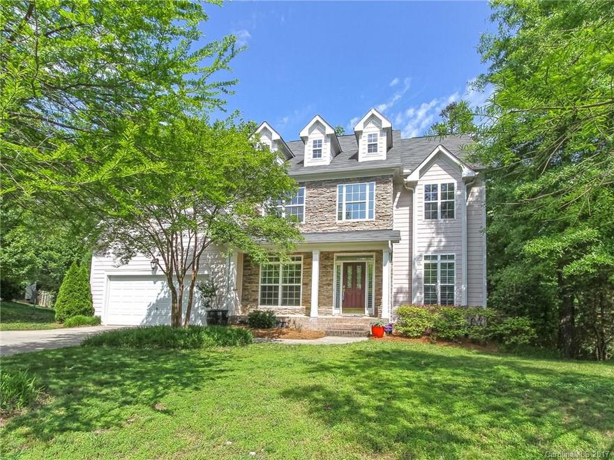 Great schools.  No HOA fees.  Beautiful home, ready for immediate move-in.   Master bedroom with sitting area.   Master closet has built ins.  Beautiful granite countertops in kitchen.  Sitting area  with fireplace off from kitchen with built in butler pantry.  Office with French doors, formal dining.  Huge deck that opens to neighborhood common area.  Minutes from lake.  Pool, tennis and golf are available.   Sidewalks and natural walking trails throughout Lake Shore.