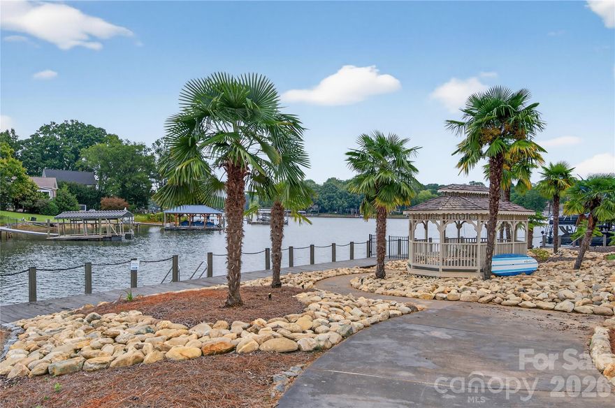 New Price AND Seller is offering $5,000 in concessions, giving buyers the opportunity to personalize and make this home their own! 

Welcome to your Lake Cottage Retreat in one of Cornelius’ most desirable locations. Perfectly positioned for an effortless lifestyle, you’re just minutes from Jetton Village Shoppes and Jetton Park—both accessible by a scenic 20-minute walk or quick bike ride along the newly added sidewalks. Enjoy easy access to nearby greenways connecting to Birkdale Village, plus convenient proximity to I-77 for a seamless commute to Charlotte.

This charming community offers lake living without the waterfront price tag! You have access to the private boardwalk located just across the cove from the popular Hello, Sailor and Holiday Marina. Launch your paddle board, take in stunning sunsets from the gazebo, a dip in the lake at the swim up ladder or relax at the saltwater pool just steps from your front door—all while enjoying included lawn care for a low-maintenance lifestyle.

Inside, the home is filled with natural light and thoughtfully designed single-level layout featuring 3 bedrooms and 2 full baths. The spacious primary suite offers tray ceilings, a walk-in closet, and a well-appointed bath with dual vanities, soaking tub, walk-in shower, and private water closet—plus direct access to your back deck for peaceful mornings or evening unwinding.

The kitchen showcases granite countertops, updated appliances, a breakfast bar that opens seamlessly to the living area with a newly installed electric fireplace and mantle—perfect for gathering and entertaining. A separate dining room, dedicated office space, and laundry room add both function and flexibility.

Meticulously maintained, this home features a new HVAC, roof, windows, hot water heater, DryPro system, and fresh paint throughout, offering peace of mind for years to come.

Set elevated from the street, the home provides a sense of privacy and presence—ideal for enjoying your morning coffee on the covered front porch or an evening glass of wine. 

Whether you're looking to downsize, simplify, or embrace the Lake Norman lifestyle, this home offers a rare opportunity in a fantastic Cornelius location.