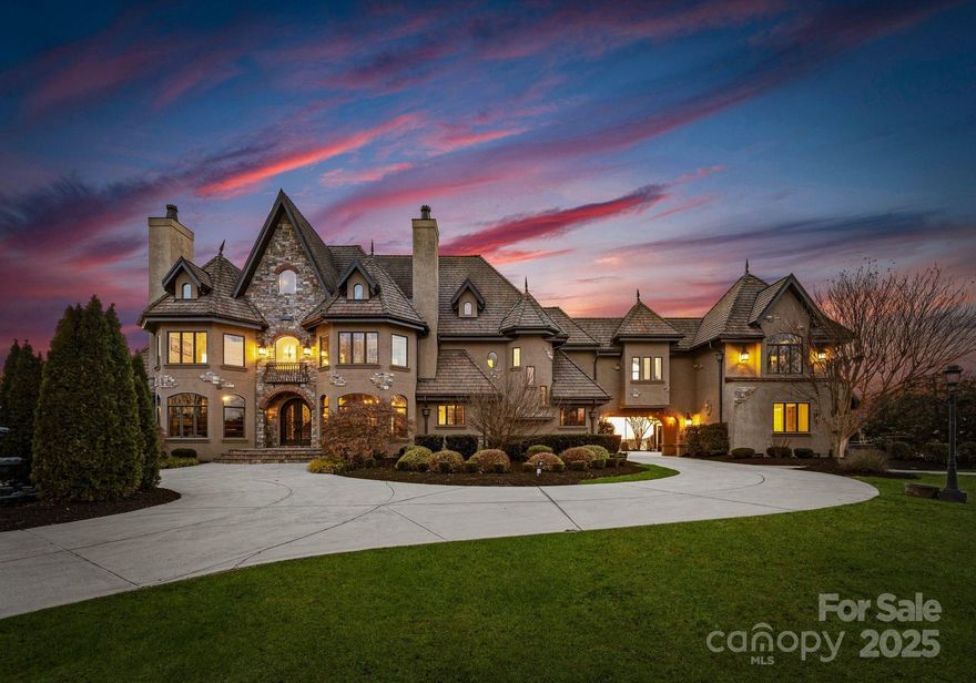 This exquisite, one-of-a-kind, European countryside estate is located on Sugar and Wine Road in Monroe, NC. This distinguished gem spanning on almost 33 acres, including a 15-acre private pond, has an endless amount of opportunities and possibilities. This estate features almost 10,000-square-foot. A French-inspired residence with five bedrooms and seven bathrooms. The property offers a waterfront Tuscan pergola for outdoor entertaining, a poolside courtyard illuminated with lights for cocktail hours, and a 4,000-square-foot concrete pad with marble accent painted floor that woudl be perfect for events. Additional amenities include lighted walkways, handicap-accessible restrooms, a fire pit, a spacious primary suite with two large walk-in closets and a beautiful custom bathroom. Upper level with three guest rooms, kitchenette, and theater room. The estate's construction boasts solid-wall design with heavy timber and stone materials, ensuring durability. This timeless estate awaits you!