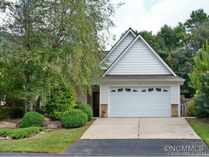 Light-filled garden home with 2-car garage in a lovely, low-maintenance community! Great kitchen w/hickory cabinets open to a lovely great room with vaulted ceilings & huge windows. The landscaping is gorgeous, and the backyard has a lush, private feel. This has been a 2nd home since it was built and feels almost new! One-level living in a stand alone home with the convenience and low-maintenance of a townhome.