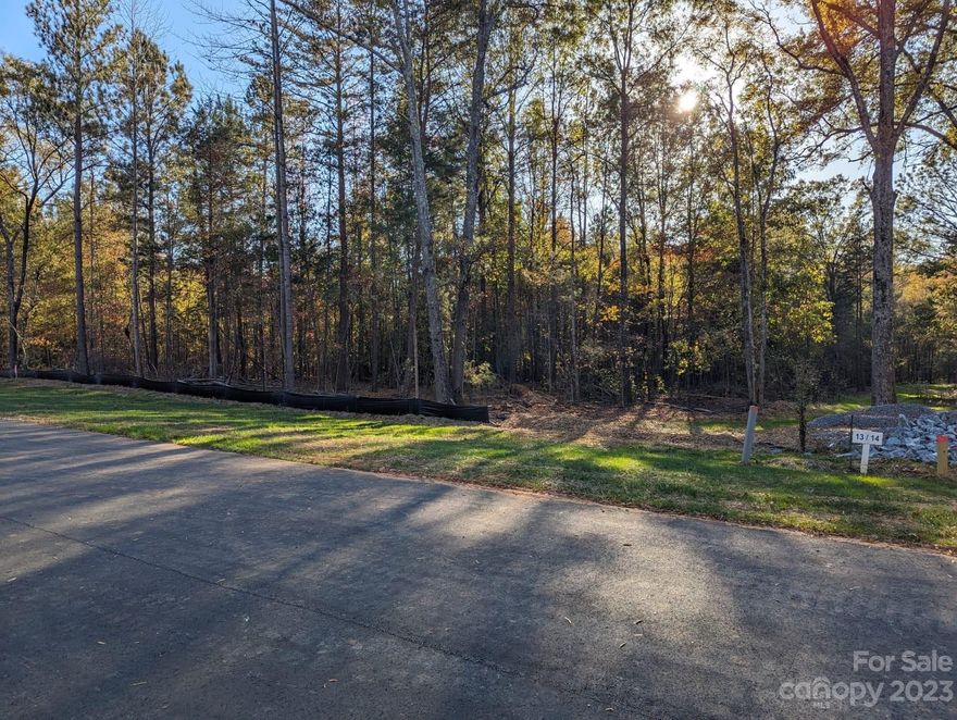 Beautifully wooded lot located in the new neighborhood, Heartland Acres. Over one acre of land. Well and septic tank needed. 4 bedroom septic tank permit included. Come check out this residential lot today to build your future dream home on!