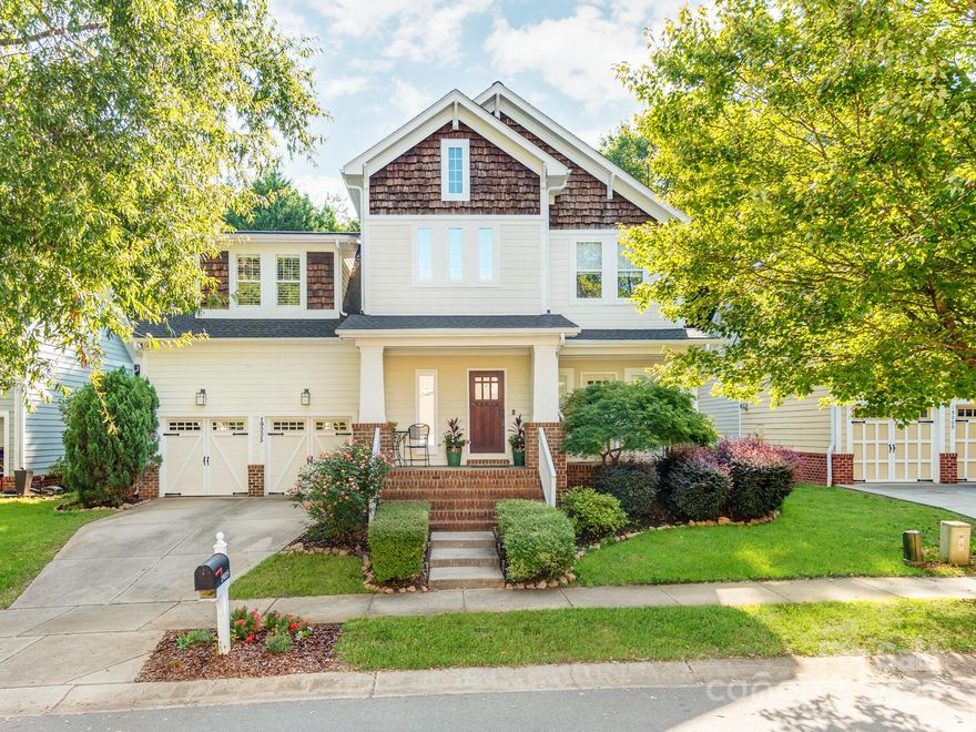 Beautiful, craftsman-style home in close proximity to Lake Norman!  Open living space features two story great room with gas fireplace and lovely hardwood floors throughout.  Light & bright kitchen with SS appliances and breakfast area leading to screen porch in your private, low maintenance backyard with firepit.  Private, main primary bedroom with tray ceiling and updated bath.  Separate dining room features beautiful coffered ceiling.  Plantation shutters throughout.  Additional bedrooms upstairs.  Media room equipped with surround sound.  Gorgeous updates are a must-see!