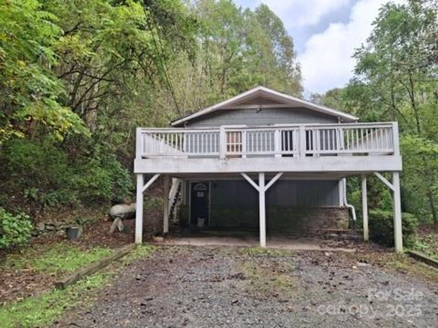 This gem is nestled in a woodland setting offering complete privacy yet is .5 miles from New Leicester Highway and 10 minutes to downtown Asheville. Enjoy the best of both worlds with this fantastic Property. Talk to your agent about pre-qualification requirements. Home is vented for woodstove.