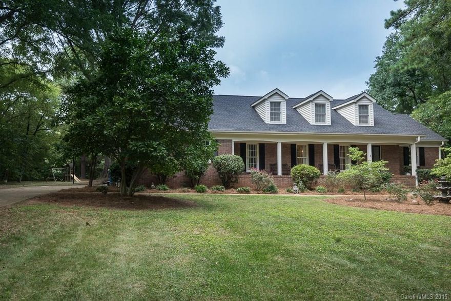 If you want a Southern homestead instead of just a house, this one is for you!  Mature oak trees with large screened porch and patio overlooking a private, fenced backyard in Meadow Lakes. 5bd/3.5 ba with master on main.  Granite kitchen, cozy family room w/ fireplace, large dining/living/study, and TONS of storage w/ 2 walk-in attics and a huge laundry room.  4 brs up, 1 could easily be used as a bonus room. Won't last long! Convenient to restaurants, shopping and medical facilities.