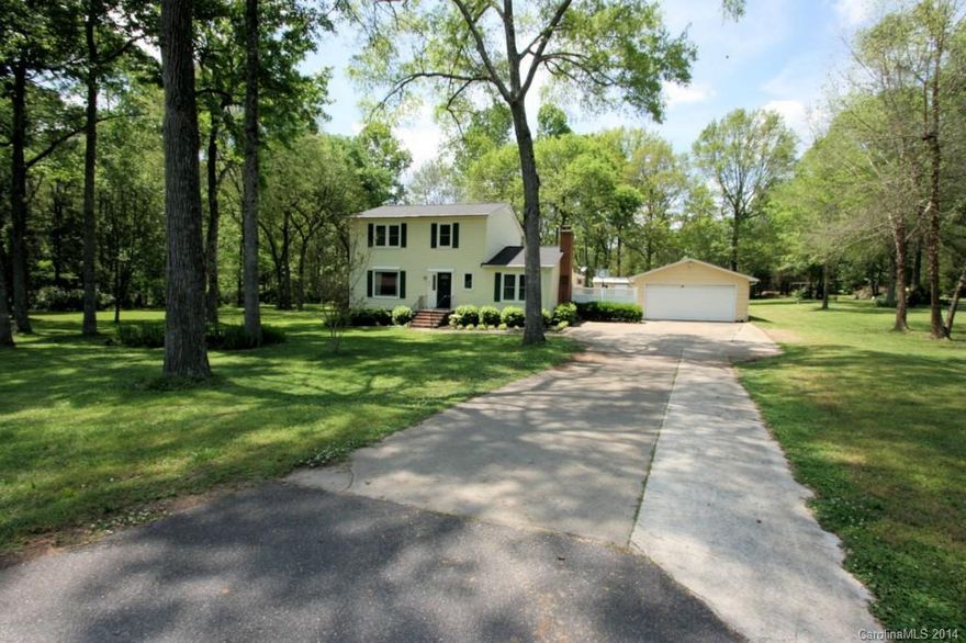 Beautiful country setting on amazing, flat 2 acre lot. Convenient to shops, restaurants, I-77.  2 story country farm house features 3BR/2.5BA w/Formal Living Room & Dining Room.  Den has built in shelves & wood burning fireplace w/blower. HUGE Flex space for a SunRm / Party Rm / Family Rm, or renovate to MBR on main, etc. Ideal for entertaining! Grill out on wrap deck & take a swim in the in-ground pool. Large Kitchen w/breakfast area. HUGE master w/large closet. Oversize garage. Wired Shed.