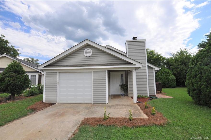 Cute ranch w/one car garage in cul-de-sac. Freshly painted neutral gray, new carpet, plantation blinds, deck re-stained, paver patio, nice landscaping, open floor plan, vaulted ceilings in GR w/ wood burning FP. Must See! One year home warranty.