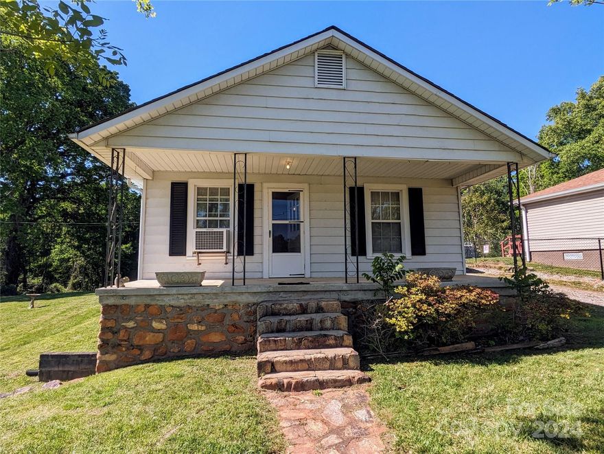 Don't miss your chance to own a piece of Marion's history and create cherished memories in this lovingly maintained home. Upon arrival, you'll be greeted by a gorgeous stone walkway leading up to a spacious front porch, perfect for socializing or sipping morning coffee. As you step inside, you'll be enchanted by the character and warmth that permeates every corner. Original features blend seamlessly with modern comforts, offering nostalgia and a chance to make the space your own. One of the property's standout features is its expansive and level yard, providing ample space for outdoor activities and potential gardening ventures. Additionally, a large storage building with electricity and a metal roof offers practicality and organization. Convenience is key with this home, as it boasts proximity to downtown Marion, parks, restaurants, and other local amenities. Whether you're seeking a peaceful retreat or a vibrant community atmosphere, this home offers the best of both worlds.