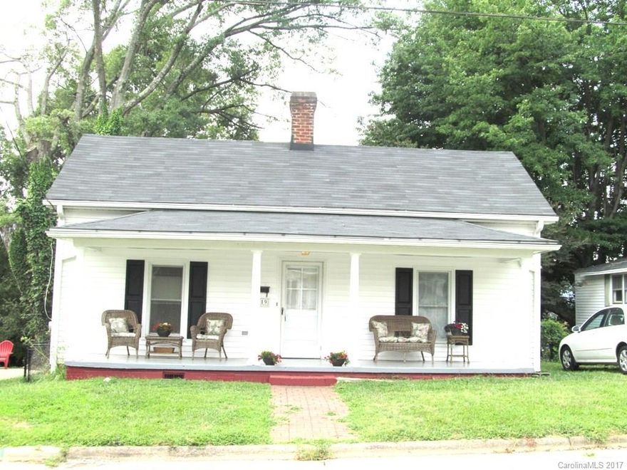 Adorably Updated Historical 2 bedroom 1 bath Bungalow close to Downtown Mooresville.  Home features fully fenced backyard, side deck and rocking chair front porch.  Home recently had a water abatement treatment in basement area, and other updates, such as NEW HVAC installed in 2014, and a roof in 2011!  Fresh paint and ALL APPLIANCES remain...turn key ready!

Listed on Historical Registry, but the only restriction known is that the home is required to remain in appearance as a mill house.