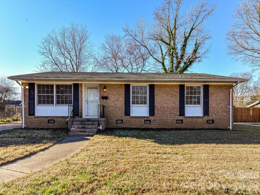 Welcome to 4008 Dunwoody, a ranch-style brick home that blends mid-century charm with today’s modern finishes and offers a great balance of style, comfort, and convenience. This move-in-ready home features 3 bedrooms and 2 bathrooms, including a primary bedroom with its own private en-suite. The refreshened interior includes granite countertops in the kitchen, LVP flooring, LED lighting, fresh paint, and tiled showers and baths. The home sits on approximately ¼ acre with no HOA, providing outdoor space that is perfect for pets or entertaining, all tucked into an established neighborhood. This home offers a great blend of space, function, and residential surroundings while remaining just minutes from everyday conveniences and the dining, shopping, and entertainment of Plaza Midwood, NoDa, Villa Heights, and Uptown Charlotte. Blending comfort, convenience, and character in an unbeatable location, this charming home is the perfect opportunity to start your next chapter.