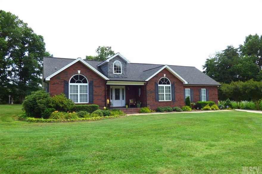 This charming three bedroom home is situated on a quiet cul-de-sac lot in HeavenSent, and is move-in ready! A welcoming covered front porch opens onto the vaulted ceiling great room with stone fireplace, beamed ceiling with accent lighting, and formal dining area. The open kitchen has bar seating, granite countertops, stainless steel appliances, and a convenient laundry closet. The split bedroom floor plan offers a master suite with huge closet and private bath with jetted tub and tiled shower. The opposite end of the house offers two spacious bedrooms sharing a hall bath with granite countertop and tile floor. Upstairs, you'll find a relaxing bonus room and office loft overlooking the great room. The level 0.7 acre lot has a rear patio and beautiful landscaping!