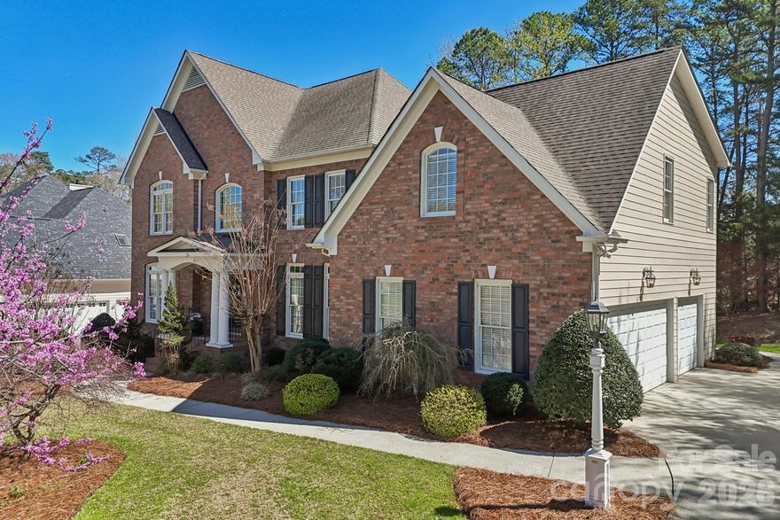 Welcome to this stunning John Wieland home nestled in the highly sought-after Lexington community in Charlotte’s vibrant University area. From the moment you arrive, the grand entrance and timeless curb appeal set the tone for what awaits inside. Step into a light-filled interior featuring gleaming hardwood floors, elegant formal living and dining spaces, and a thoughtfully designed open layout perfect for both everyday living and entertaining. The spacious kitchen is the heart of the home, offering granite countertops, a breakfast bar, and seamless flow into the main living areas. Dual staircases add both function and architectural charm, leading to an expansive second floor where all bedrooms are thoughtfully positioned for maximum privacy. The open loft/bonus area provides flexible space for a media room, playroom, or home office. The primary suite is a true retreat, featuring soaring ceilings in the spa-like bath, dual vanities, a soaking tub, and a separate shower. Looking for room to grow? The walk-up third floor offers over 560 square feet ready to be finished—ideal for additional living space, a guest suite, or a private office. Outside, enjoy mature landscaping and a side-load 3-car garage that enhances both convenience and curb appeal. Living in Lexington means embracing a lifestyle—residents enjoy access to a clubhouse, swimming pool, tennis courts, pickleball courts, and a playground, all within a beautifully maintained, walkable neighborhood with tree-lined streets and streetlights.
Perfectly located with easy access to I-85 and I-485, and just minutes from UNC Charlotte, Concord Mills, and Northlake Mall, this home offers the ideal blend of comfort, convenience, and community.