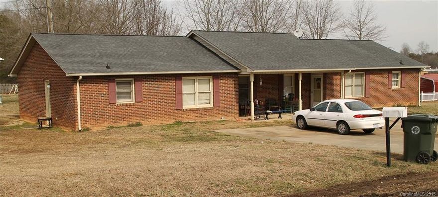 Brick Duplex located near Cherryville High School,  Corner lot, long term tenant only pays $475/month, other unit currently leased for $550,  based on other rentals potential income could be increased, laminate flooring, roof approx. 8 to 9 yrs