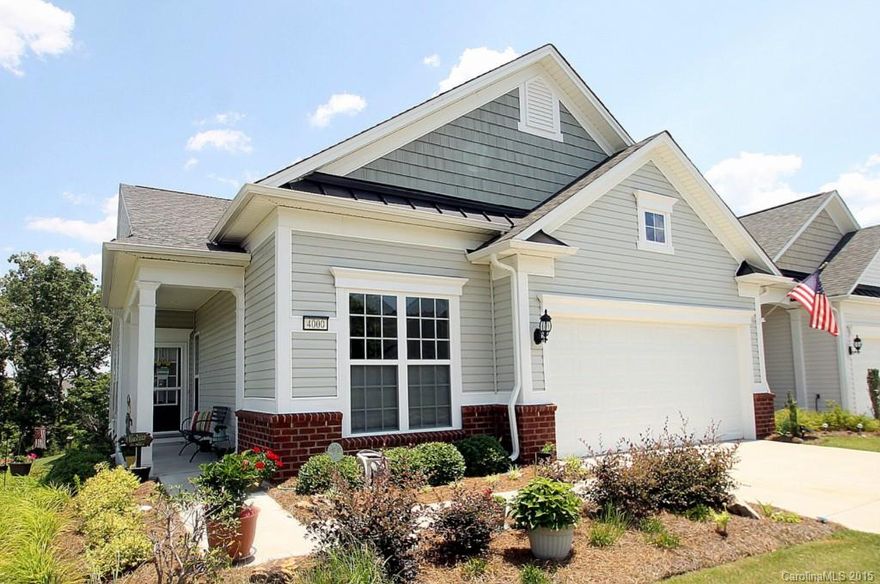 Muirfield Villa w/ 3-Season Room & Extended Patio! Espresso Hardwoods in Living Areas! Foyer leads to Spacious Great Room. Kitchen w/ Stainless Steel Appliances, Gas Range Oven, Granite Counters, Tile Backsplash, Pantry, & Island. Dining Nook w/ Wainscoting. Custom 3-Season Room opens to Extended Patio w/ Wooded View. Owner’s Suite & to Private Bath w/ Dual Sinks, Shower, & Walk-In Closet. Guest Bedroom & Guest Bathroom. Library Provides Additional Living Space. Activites Galore in 55+ Community