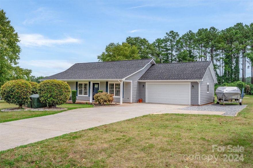 Welcome to this charming 3 bedroom 2 bathroom ranch home situated on over half an acre lot! Nestled in a quiet neighborhood, this home combines comfort and privacy with the convenience of all that Mooresville has to offer. Upon entering, you will be greeted by a cozy living area with vaulted ceilings. Enjoy your morning coffee in the breakfast nook which overlooks the expansive backyard, perfect for entertaining or unwinding in the tranquility of nature. The kitchen boasts granite counter tops and sleek black appliances. A brand new roof was just installed April 2024! Garage door was replaced in 2023. Equipped with Blink video doorbell, epoxy coating on garage floor, spacious tiled shower and granite counter tops in master bath, this meticulously maintained home is move in ready! Don't miss out on making this your new Home Sweet Home! 
*Measurements and floor plan will be uploaded on Monday 7/22/24