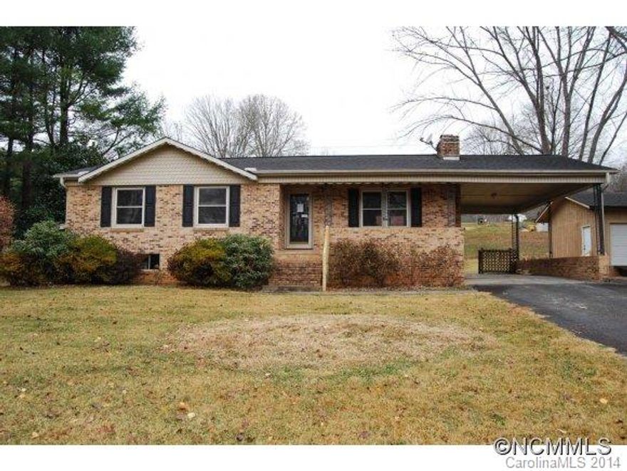 Brick 2BR/2BA home in Mills River with loads of potential! Full unfinished basement to renovate at your pleasure. Main level has nice hardwood floors in the combined kitchen and dining room, as well as the living room. Back porch views for entertaining and relaxing. Attached carport. Lots of storage in detached outbuilding.This is a Fannie Mae property.