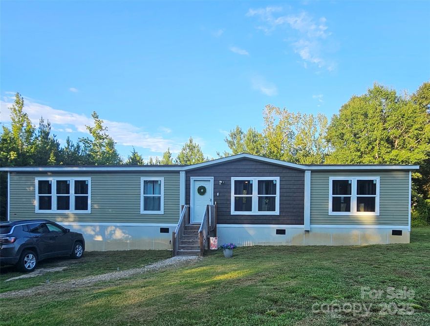 Welcome to 2724 Ballindam Rd, Chester, SC — a farmhouse-inspired modern home designed for comfort, style, and everyday living. This spacious 3 bedroom, 2 bath home with 1,736 sq ft features an open concept layout with multiple living areas. The kitchen is a true centerpiece with rich wood cabinetry, a large center island, stainless steel refrigerator, farmhouse sink, and abundant counter space. The dining area flows seamlessly into the living room, complete with custom built-ins, while the den and flex room provide versatile spaces for a home office, playroom, or media room. The private primary suite (15’ x 12’7”) offers a relaxing retreat with its own bath, while two additional bedrooms share a full bath. Outdoors, the property includes an open yard, a storage shed, and berm. Centrally located between Charlotte and Columbia, this home offers a peaceful setting with convenient access to big-city amenities.

3 Bedrooms | 2 Bathrooms | 1,736 Sq Ft
Farmhouse/Modern Style with Open Floor Plan
Large Kitchen with Island & Farmhouse Sink
Flex Room + Den for Extra Living Space
Storage Shed + Berm 
Easy Commute to Charlotte or Columbia

Move-in ready and full of thoughtful details — don’t miss it!