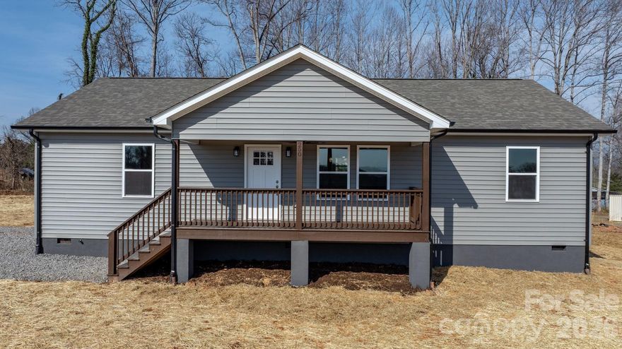 Welcome to 250 Old Lumber Yard Road! This beautiful new construction home offers the ease of one-level living and is ready for its first owners. Featuring an open-concept layout, this 3-bedroom, 2-bath home sits on a 0.50-acre lot, providing plenty of room to enjoy outdoor living while still being conveniently located.
Step inside to find beautiful flooring throughout and a bright, inviting living area that flows seamlessly into the kitchen and dining space — perfect for everyday living or entertaining. The kitchen features stainless steel appliances, granite countertops, and ample cabinetry, combining style and functionality.
Relax on the front porch and take in the year-round mountain views, a perfect spot for morning coffee or evening sunsets. The nearly one-acre lot offers space for gardening, outdoor activities, or simply enjoying the peaceful setting. Conveniently located in the heart of Glen Alpine, this home is just minutes from I-40 and downtown Morganton, providing quick access to shopping, dining, and everyday conveniences while still enjoying a quiet community atmosphere. Don’t miss your chance to own this brand-new home — schedule your showing today!