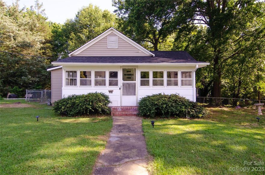 Adorable 2 bedroom / 1 bath 1920's Bungalow within walking distance to Bessemer City! Updates throughout home, new fixtures, updated bathroom and fresh paint. Features include, High Ceilings, Newer Roof, New HVAC, Enclosed Front Porch and large private fenced yard!