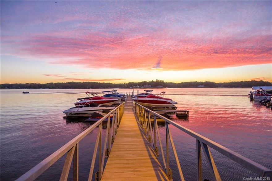 Hands down, THE best views on the lake from this waterfront townhome! One owner, hard to find end unit boasts lots of natural lighting and exceptional water views from every level! Never lived in full time, used as vacation home. Updates include new granite counter tops and paint. Townhome (not a condo) has unique features no other building in neighborhood has including central vac and intercom system. Neighborhood with private beach, tennis courts, boat storage, pool, clubhouse and boat slips!