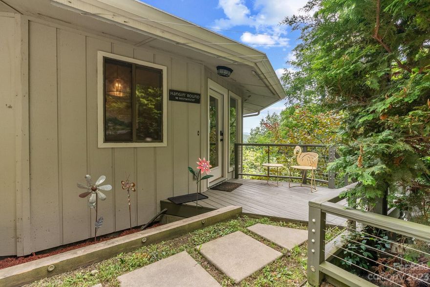 Perched above the stone gate at the entrance to Montreat, this unique rondette-style home is the perfect place to unwind and enjoy the mountains. Minutes away from downtown Black Mountain as well as ample opportunities for outdoor recreation & relaxation. The home features gathering spaces on each level, two fireplaces, windows galore, and lots of deck space to take in the mountain views. Home is being sold fully furnished, with only a few minor exceptions. Whether you're looking for a full-time residence, mountain getaway, or vacation rental property, this home fits the bill. Recently remodeled & move-in ready!
**Recent guests have checked out & the home is now available for showings!**