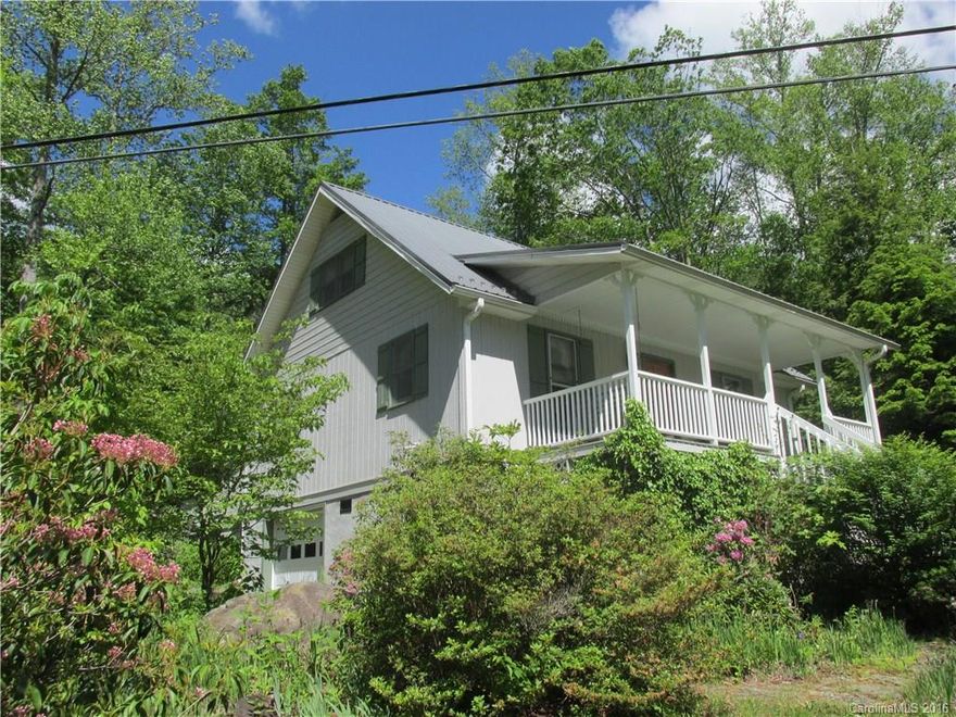 PRIVATE, SOUNDS OF CREEK, Natural lush extensive landscaping are just a few of the benefits you will have in this cabin. Main level home has 2 bedrooms 2 baths, laundry, living room and kitchen. cathedral ceiling with T&G pine. Loft. Huge back screened in porch to relax. Home has full basement with additional room being used as another sleeping area, plus 2 car garage. Close to US Forest Service trails, fishing, Blue Ridge Parkway and Mt. Mitchell Golf Course.