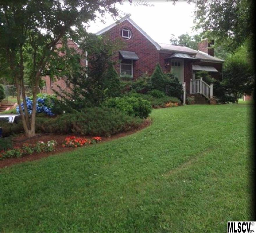 This two bedroom, two bath brick ranch is loaded with lots of character & charm! Kitchen has custom maple cabinets with cherry finish, double wall ovens, porcelain tile & a fantastic pantry to the side. Hardwoods & tile throughout, along with built-in shelves & two fireplaces. In the basement is a great workshop. A wonderful deck for outdoor living space. MUST SEE!!!