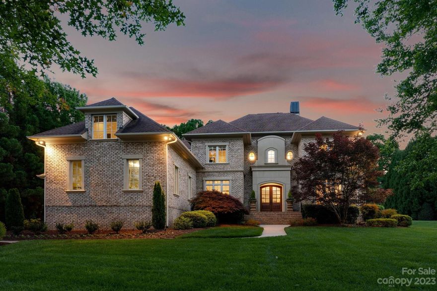 Exceptionally designed full brick home, located in the highly sought after gated neighborhood Skyecroft. This home is situated on a acre plus lot. Upon entering, you will see the gleaming hardwoods and family room with a gorgeous fireplace and built-in's. The home features a main level primary bedroom with walk-in closet and large windows overlooking backyard. There is a private office with French doors, formal dining room and living room overlooking the lush private backyard. The gourmet kitchen is perfect for entertaining, with a breakfast area and walk-in pantry. The upper level features a bonus room, theater room, 4 guest rooms with walk-in closets and 3 bathrooms. This home has a wonderful floor plan and flow. The oversized garage has plenty of storage. The rear covered porch and patio are perfect for entertaining. This community has wonderful amenities and is breath taking! Conveniently located to all shopping, restaurants and major highways. Top rated Union County schools.