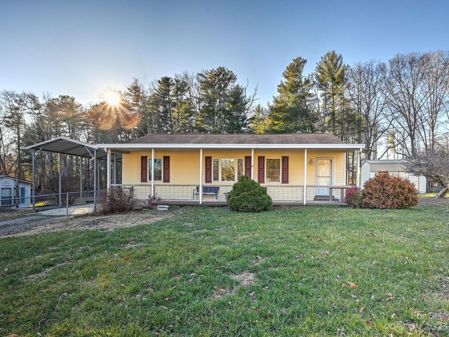 Endless possibilities await you at this tastefully updated cottage nestled in the heart of Fletcher. Whether you're looking to homestead, start a hobby farm or investing in an Airbnb, this home is the perfect candidate for you. Situated on 0.54 completely fenced acres it's ready for your chickens, goats, or mini highland cows. Farm life not your style? How about STR? This completely updated 2 bedroom/2 bath home will charm you the minute you walk through the door. From the freshly painted walls to the amazing kitchen, no detail has been overlooked. The sunroom provides a great space to unwind and enjoy the privacy offered by this amazing home. The covered front porch showcases the distance mountain views and the side patio is a great space to relax and enjoy an evening by the firepit. Maybe you'll just keep it all to yourself and live the laid-back lifestyle it provides along with all the convenience of Airport Rd and Hendersonville Rd. Don't let this one get away!