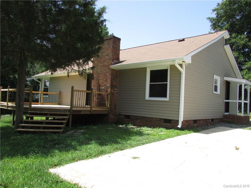 Beautiful updated ranch home in desirable location. Granite, new cabinets, SS appliances, new floors, new carpet, new light fixtures, new back deck, smooth ceilings, new paint, new siding, and new windows. Kitchen w/ pantry. Large master suite w/walk in closet and area for vanity table/computer nook. Secondary bedrooms over sized with large closets. Eat in kitchen. Open dining and family room combo. Brick fireplace with wood burning stove. 5 year warranty on all appliances. Must see! Great Home.