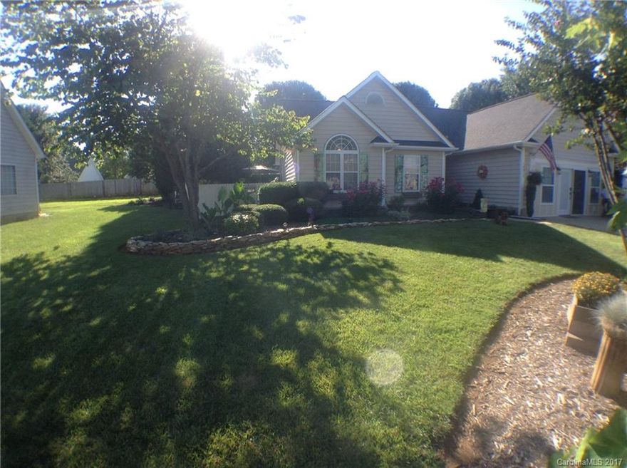 "Very Desirable home in Huntersville" Don't miss this Beautiful 3 bedroom 2 bath home in the sought after Covington Subdivision. Vaulted ceilings in the Great Room and Bedrooms. laminate and tile floors throughout the home. Plantation Blinds. The 2 car garge has been enclosed and has a separate Electric Heat and Air,  and makes for a great workshop or craft area or game room. Enjoy the quiet setting of a home on the end of the cul-de-sac.