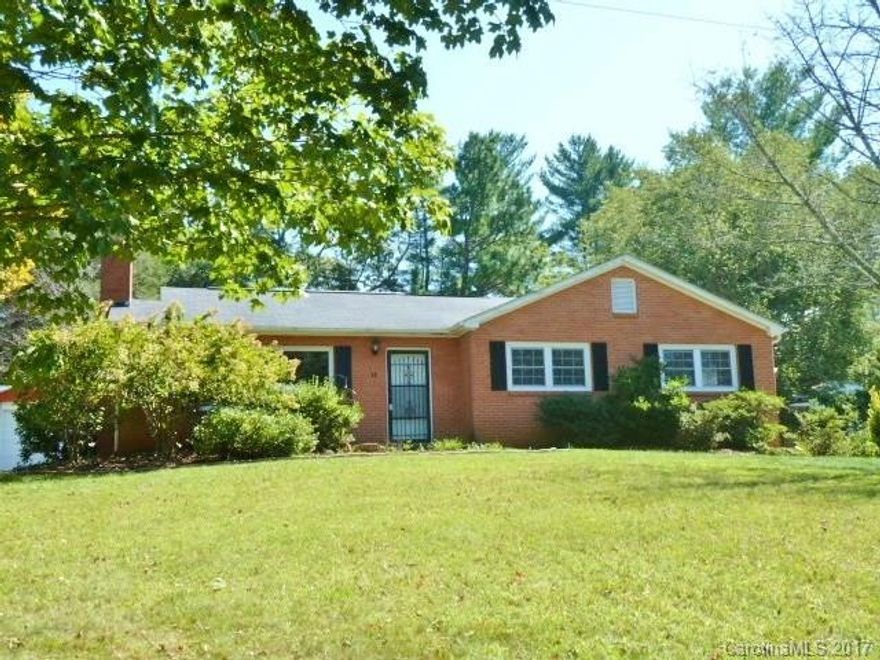 Convenient location- 3 /1.5 bath home in E. Asheville with tons of natural light making this one home a must see. Red Oak hardwoods throughout, wood burning f.p. , 2 bonus rooms in the lower level in addition to a 2 car garage, vinyl tilt windows, 2012  heat pump and  2017 hot water heater.  Did I mention the stand alone office/ workshop in the back yard? Seller converted half the space to a functioning office, and left the remaining space for garden utensils.  Great yard for outdoor fun.
