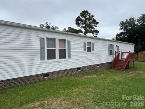 Photo of 820 Magnolia Drive #34, Sunset Beach, NC 28468 (MLS # 4433369)
